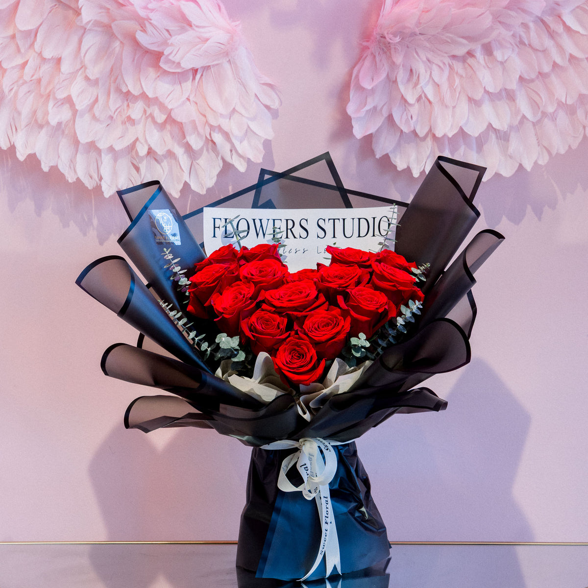 Dozen Red Roses with Black Wrapping Paper